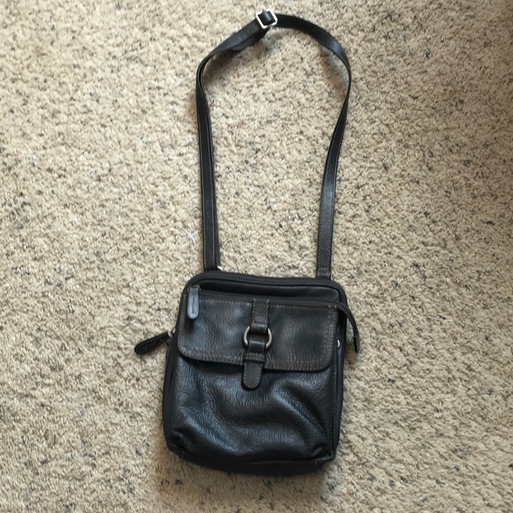Brown leather fossil purse.
